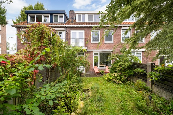 Foto - Te koop: Sfeervolle tussenwoning met groene oase!
